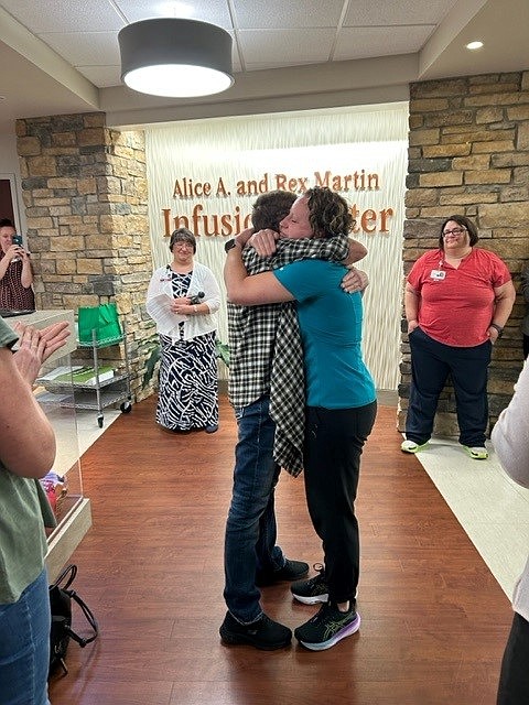 Nurse Abigail Nehls (R), hugs her patient, Kathy Gears, after receiving Goshen Health’s DAISY Award. Gears’ daughter, Katie Parmalee, nominated Nehls for providing compassionate care for her mother during her cancer treatments.

Photo Provided