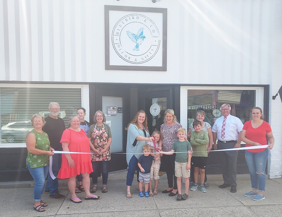 Pierceton Chamber of Commerce held a ribbon-cutting Thursday for Bluebird & Co., 123 N. 1st St., Pierceton. Pictured are owners of Bluebird & Co., Kathy and Alicia Evans; family and neighbors and chamber members and ambassadors. Photo by Jackie Gorski, Times-Union