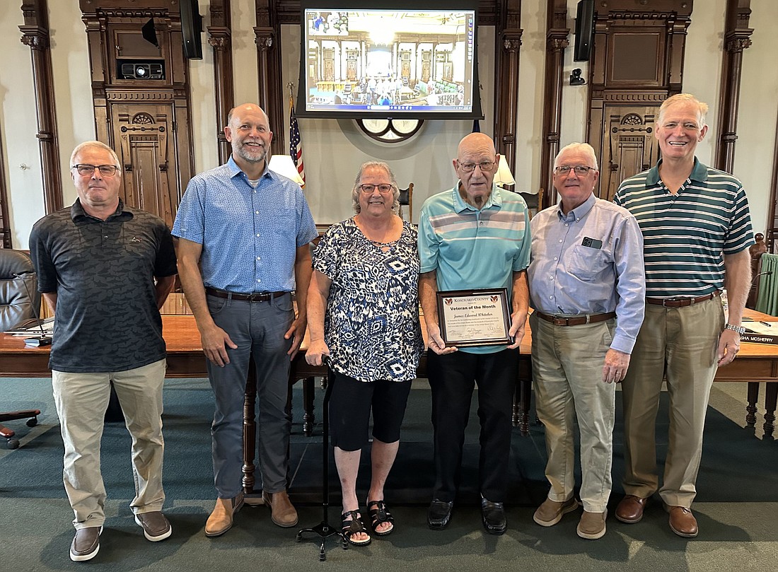 James Whitaker is the August 2023 Kosciusko County Veteran of the Month. Pictured (L to R) are: Darryl McDowell, veteran service officer; Cary Groninger, county commissioner; Barbara and James Whitaker; Bob Conley and Brad Jackson, commissioners. Photo by David Slone, Times-Union