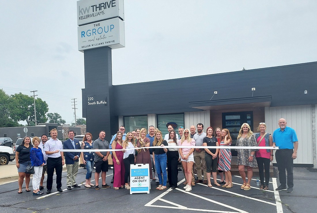 Kosciusko Chamber of Commerce held a ribbon-cutting Wednesday for The R Group, 220 S. Buffalo St., Warsaw. Pictured are The R Group staff, friends and family and Chamber staff and ambassadors. Photo by Jackie Gorski, Times-Union