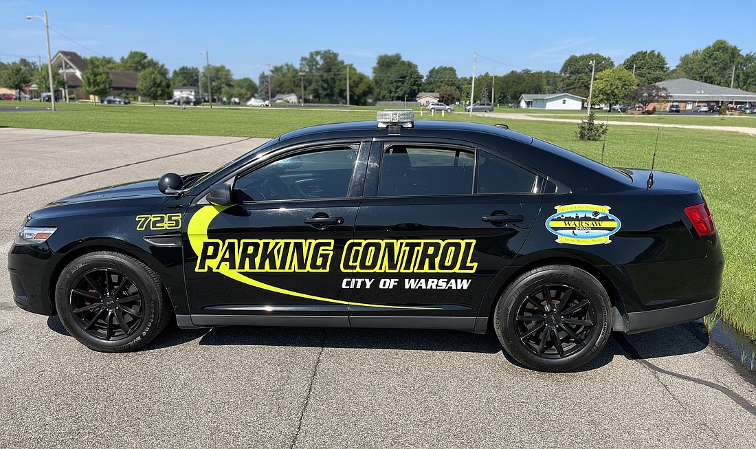 The Warsaw Police Department’s parking control vehicle has a new look to it. A black Ford Taurus (repurposed police commission) now has neon yellow graphics outlining “Parking Control” and while there are similarities to city police cars, the difference between the two is obvious. As with other city vehicles, there is a city logo on the side. It is equipped with a communications radio and an amber lightbar. Photo Provided.