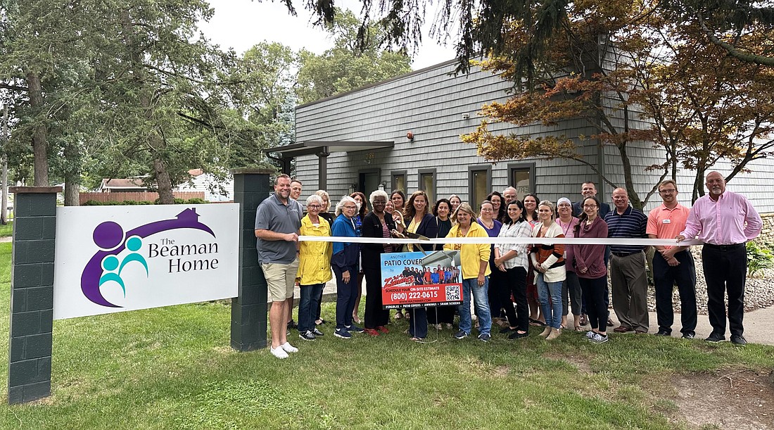 Kosciusko Chamber of Commerce held a ribbon-cutting for the new awnings and sign at The Beaman Home. A grant from the Dr. Dane and Mary Louise Miller Foundation funded the awnings and sign, while W.A. Zimmer put the awnings in place. Pictured at the ribbon-cutting are representatives of The Beaman Home, Chamber of Commerce and W.A. Zimmer. Photo by David Slone, Times-Union