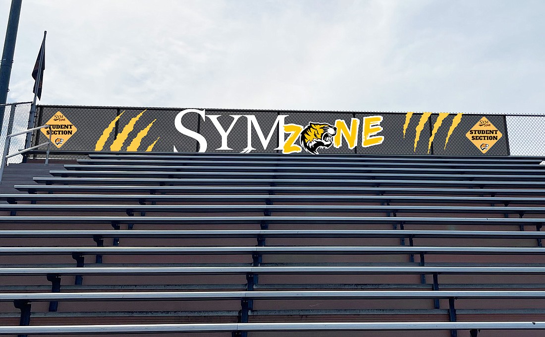 The Warsaw Tiger cheer block, known as the “SYM Zone”