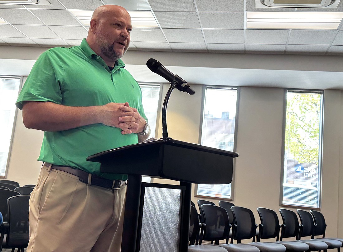 Warsaw city engineer Aaron Ott talks to the Board of Public Works and Safety on Friday about the sidewalks and alley bids. Photo by David Slone, Times-Union