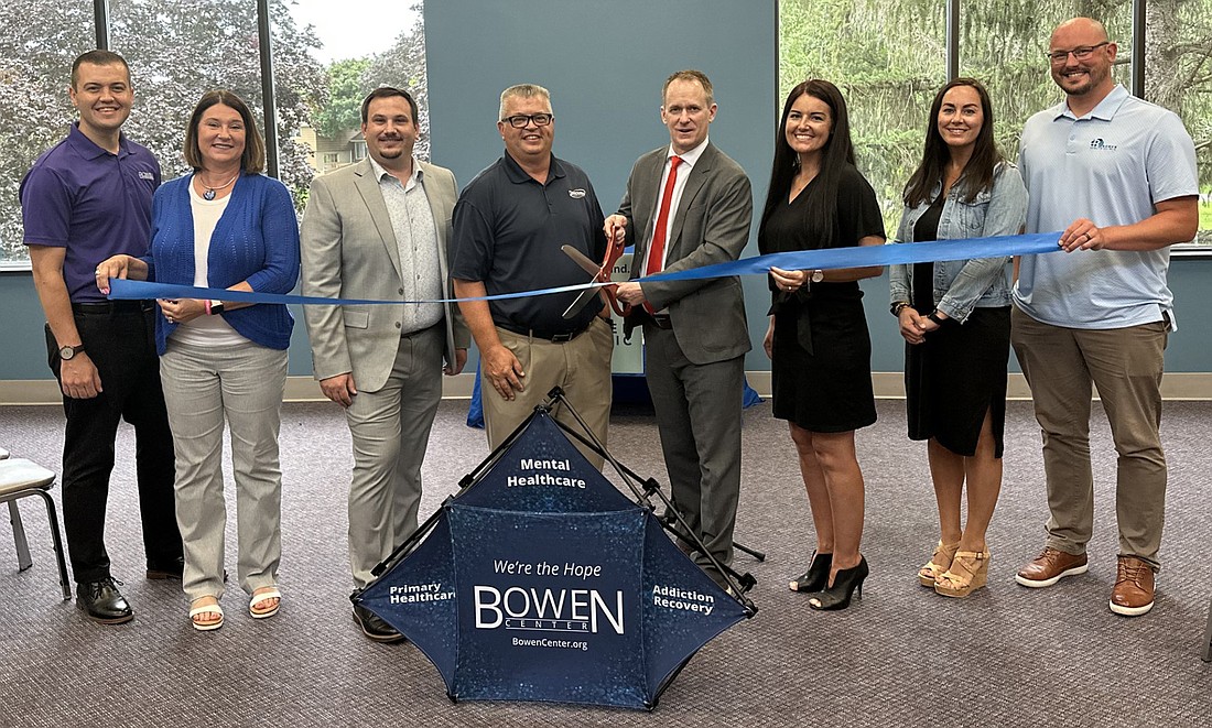 Pictured (L to R) are: Turner Duckett, Bowen Center - Kosciusko County assistant director; Cindy Brady, Bowen Center Board of Directors member; Mike Murphy, Bowen Center senior director - Kosciusko County; Rob Parker, Kosciusko County Chamber of Commerce president and CEO; Dr. Rob Ryan, Bowen Center president and CEO; Tera Yoder, Bowen Center director - Kosciusko County; Johanna Hendrikse, Bowen Center - Kosciusko County assistant director; and Sean Bergsma, Bowen Center - Kosciusko County assistant director. Photo by David Slone, Times-Union