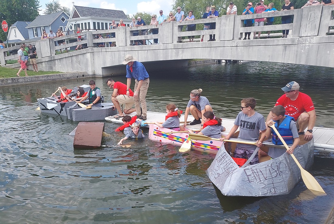 Five of the six teams of Edgewood Middle School students race against each other during Saturday’s Canal Days. Unfortunately, The Big Brain Boys’ boat sunk before launch. The Millenium Falcon would later sink during the race. Photo by Jackie Gorski, Times-Union