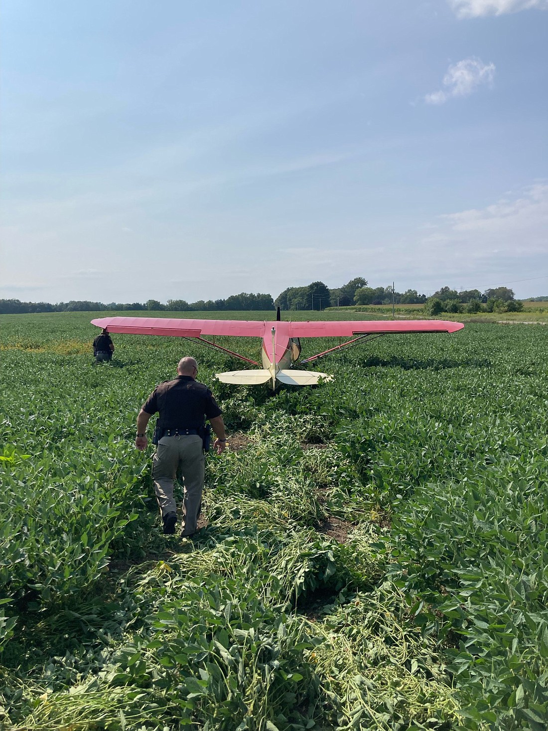 No injuries were reported when this 1947 Piper PA-12 two-seater prop plane made an emergency landing south of Warsaw. Photo Provided by Kosciusko County Sheriff’s Office