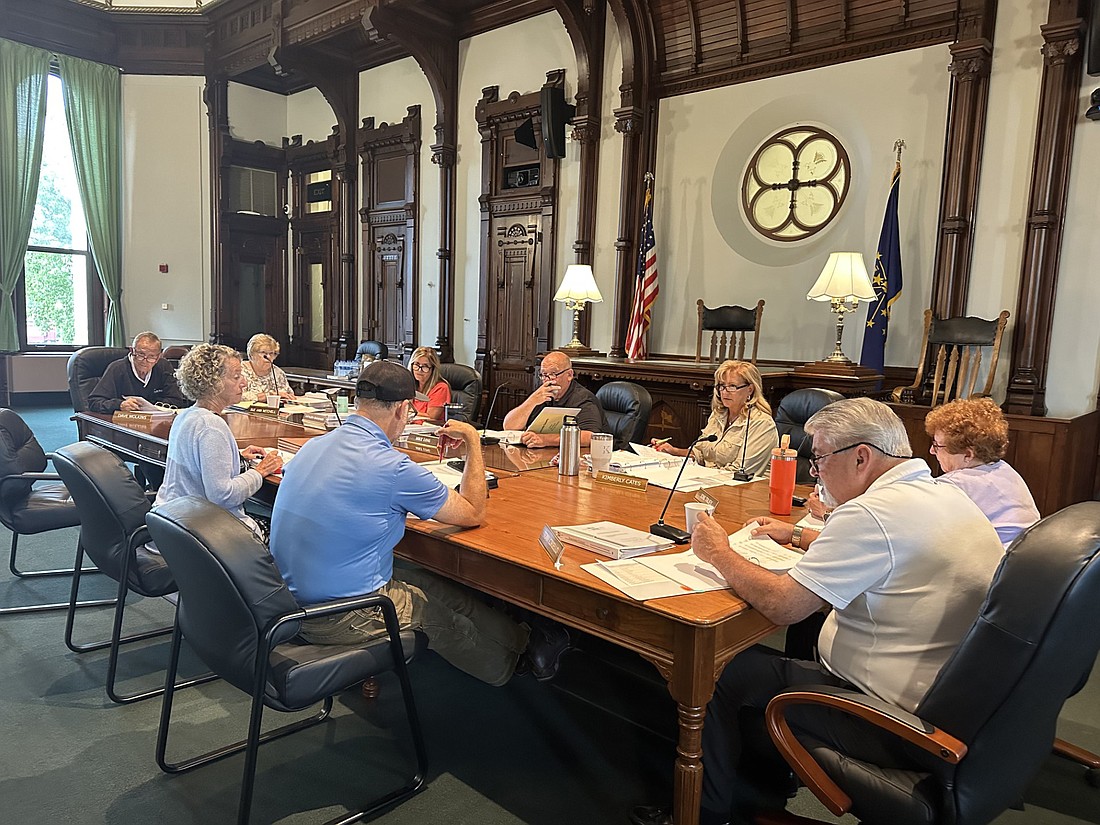 The first of two days of Kosciusko County Council budget meetings started shortly after 8 a.m. Wednesday, with the commissioners’ budgets up first. Pictured (L to R) are Dave Wolkins, councilman; Marsha McSherry, county administrator; Sue Ann Mitchell, councilwoman; Cary Groninger, commissioner; Kathleen Groninger, council vice president; Mike Long, council president; Kimberly Cates, councilwoman; Tony Ciriello, councilman; and Joni Truex, councilwoman. Photo by David Slone, Times-Union