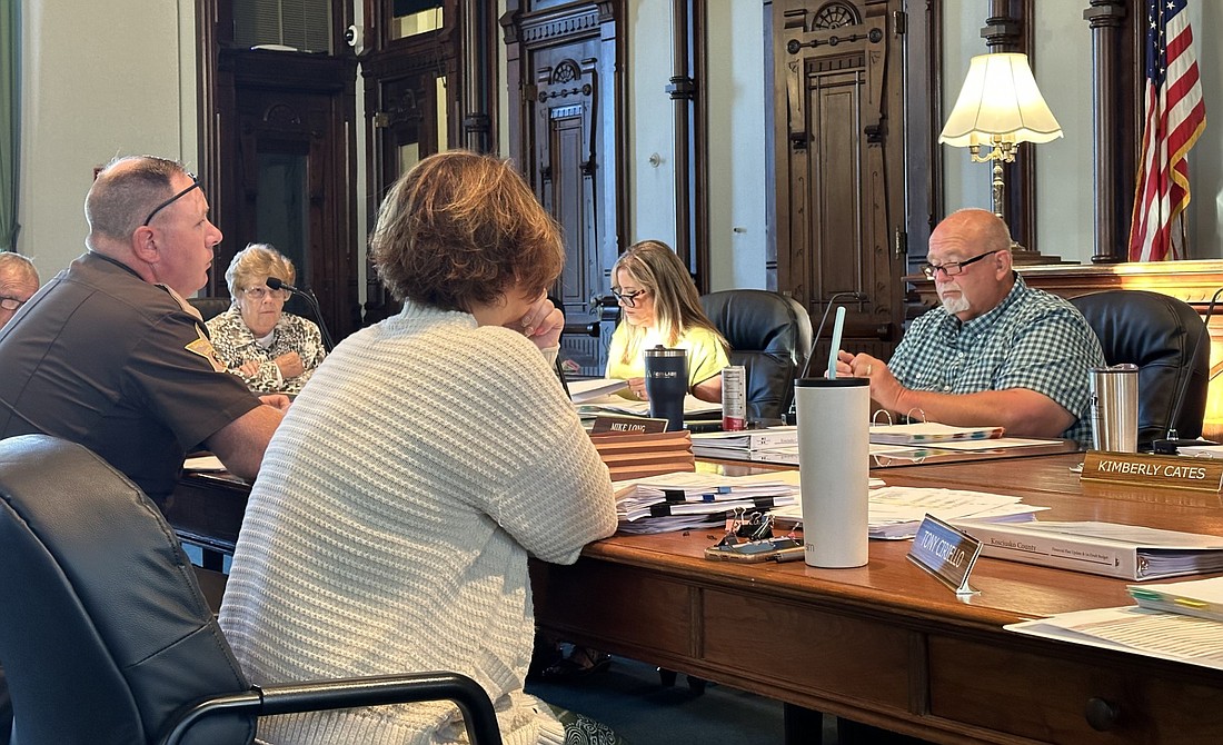 Kosciusko County Sheriff Jim Smith (L) and matron Michelle Hyden (R) discuss the 2024 budgets for the sheriff’s office with the county council Thursday. Photo by David Slone, Times-Union