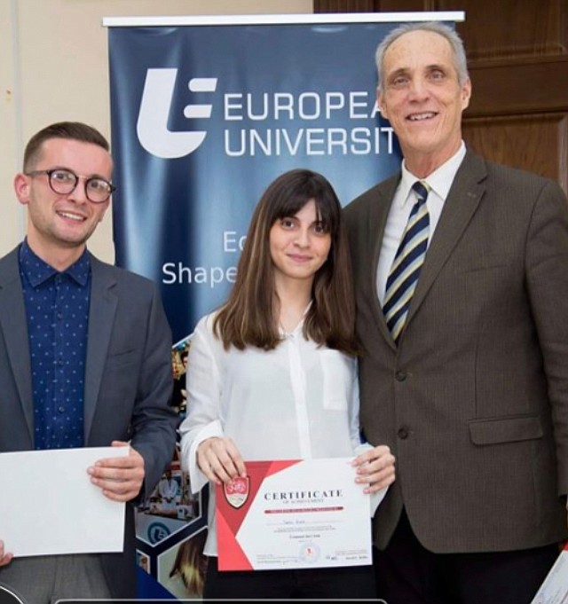 Longtime local attorney and former Kosciusko County prosecutor David Kolbe (R) is shown with an U.S. embassy representative (L) and one of the law students Kolbe taught through his time as senior visiting professor for the Center for International Legal Studies in Europe. Photo by Leah Sander, InkFreeNews