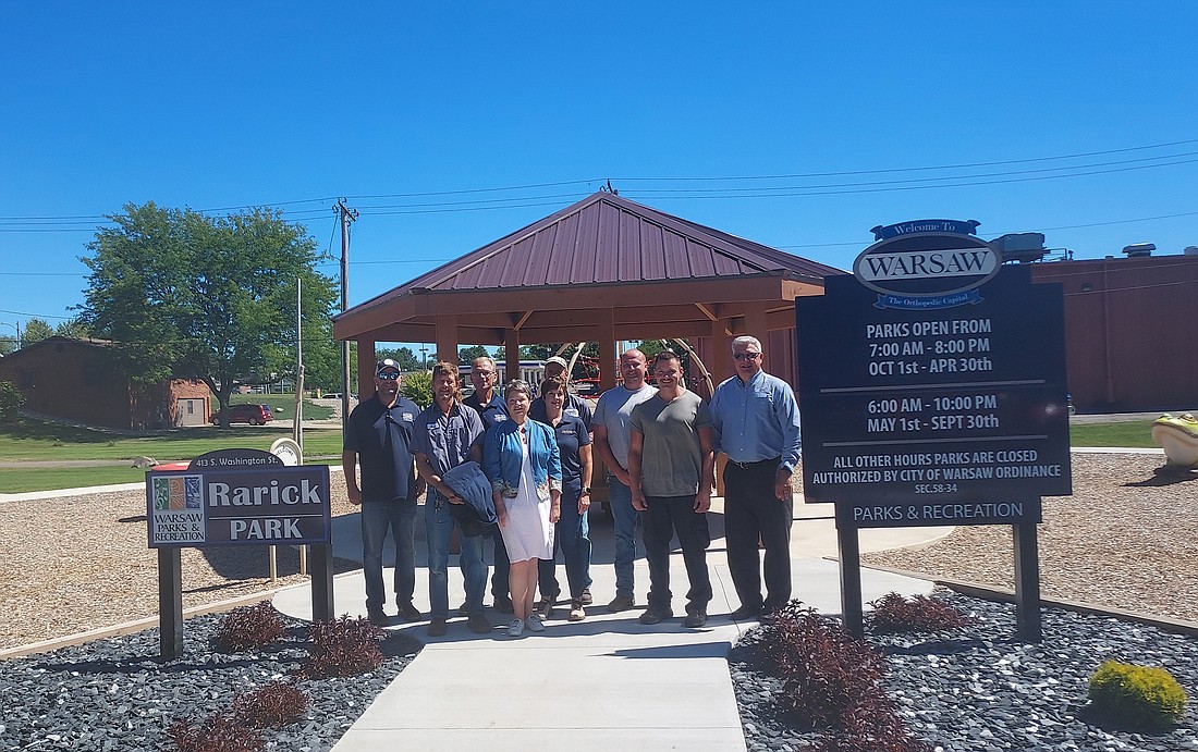 Pictured are Shaun Gardner, maintenance director; Ben Mikel, Parks Department; Larry Plummer, Parks & Recreation superintendent; Michelle Boxell, Park Board; Mark Mikel, Parks Department;  Wendy Mink, Midstates Recreation; Adam Howard, maintenance supervisor; Dustin Wiggs, Parks Department; and Joe Thallemer, Warsaw mayor. Photo by Jackie Gorski, Times-Union