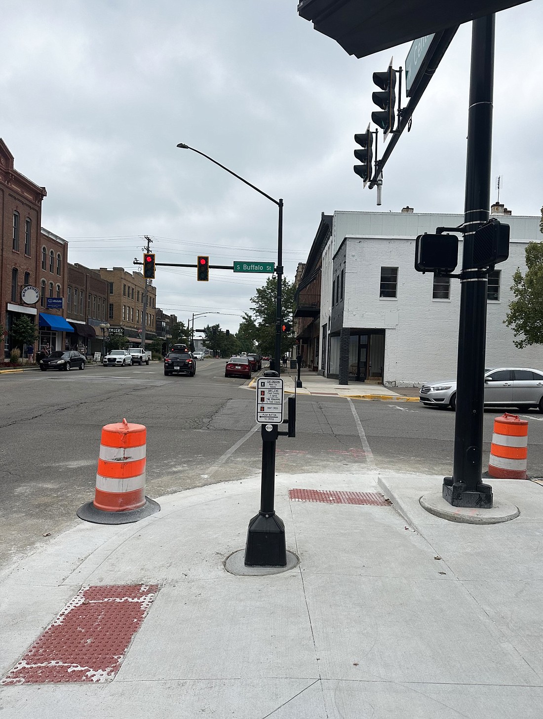 Warsaw Common Council members Jack Wilhite and Cindy Dobbins pointed out Wednesday during the Traffic Commission meeting how nicer the sidewalk crossing/corner is at the intersection of Center and Buffalo streets next to City Hall. The corner has been re-engineered and lowered. Photo by David Slone, Times-Union