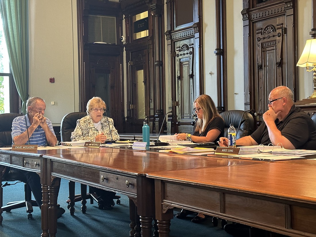 Kosciusko County Councilwoman Sue Ann Mitchell (second from left) lays out the wage committee recommendations for 2024. Also pictured are Council members (L to R) Dave Wolkins, Kathleen Groninger and President Mike Long. Council members not shown are Tony Ciriello, Joni Truex and Kimberly Cates. Photo by David Slone, Times-Union