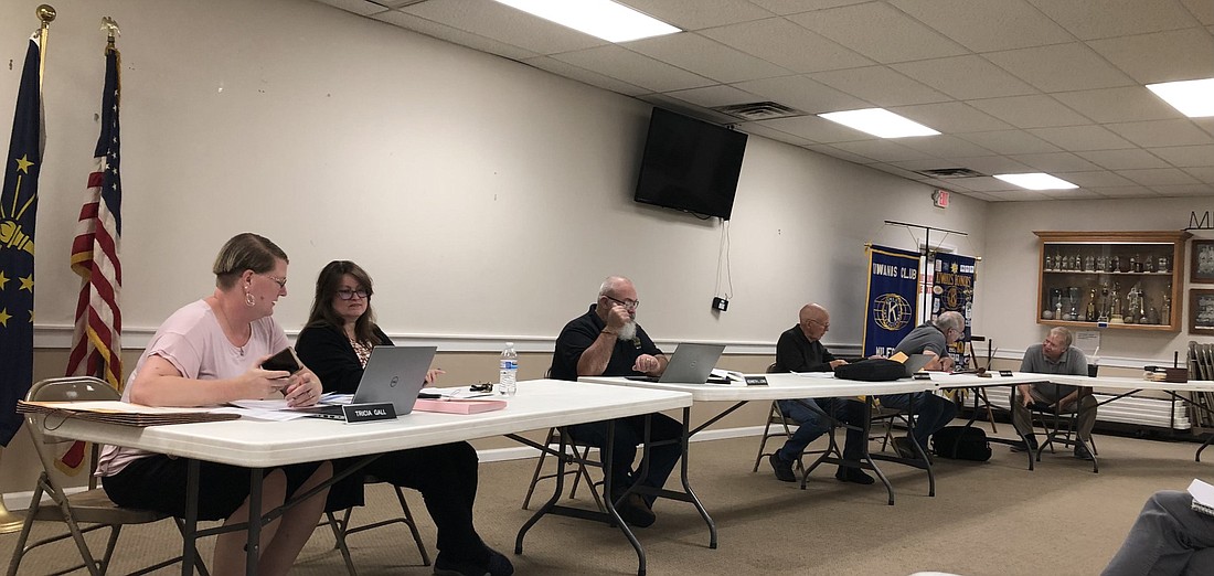 Milford Town Council members prepare right before the start of the meeting Monday. Pictured (L to R) are Clerk-Treasurer Tricia Gall, Deputy Clerk Renda Loetz, Councilman Kenneth Long, Councilman Bob Cockburn, Council President Doug Ruch and town attorney Jay Rigdon. Photo by Denise Fedorow