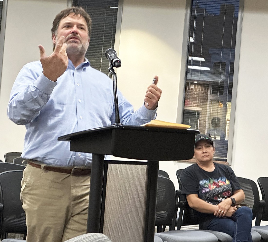 Attorney Jack Birch (L), representing Taquiera El Comal owners Tony and Hermila (R) Mendoza, explains the supplemental 210 alcohol licenses to the Warsaw Common Council Monday. Photo by David Slone, Times-Union