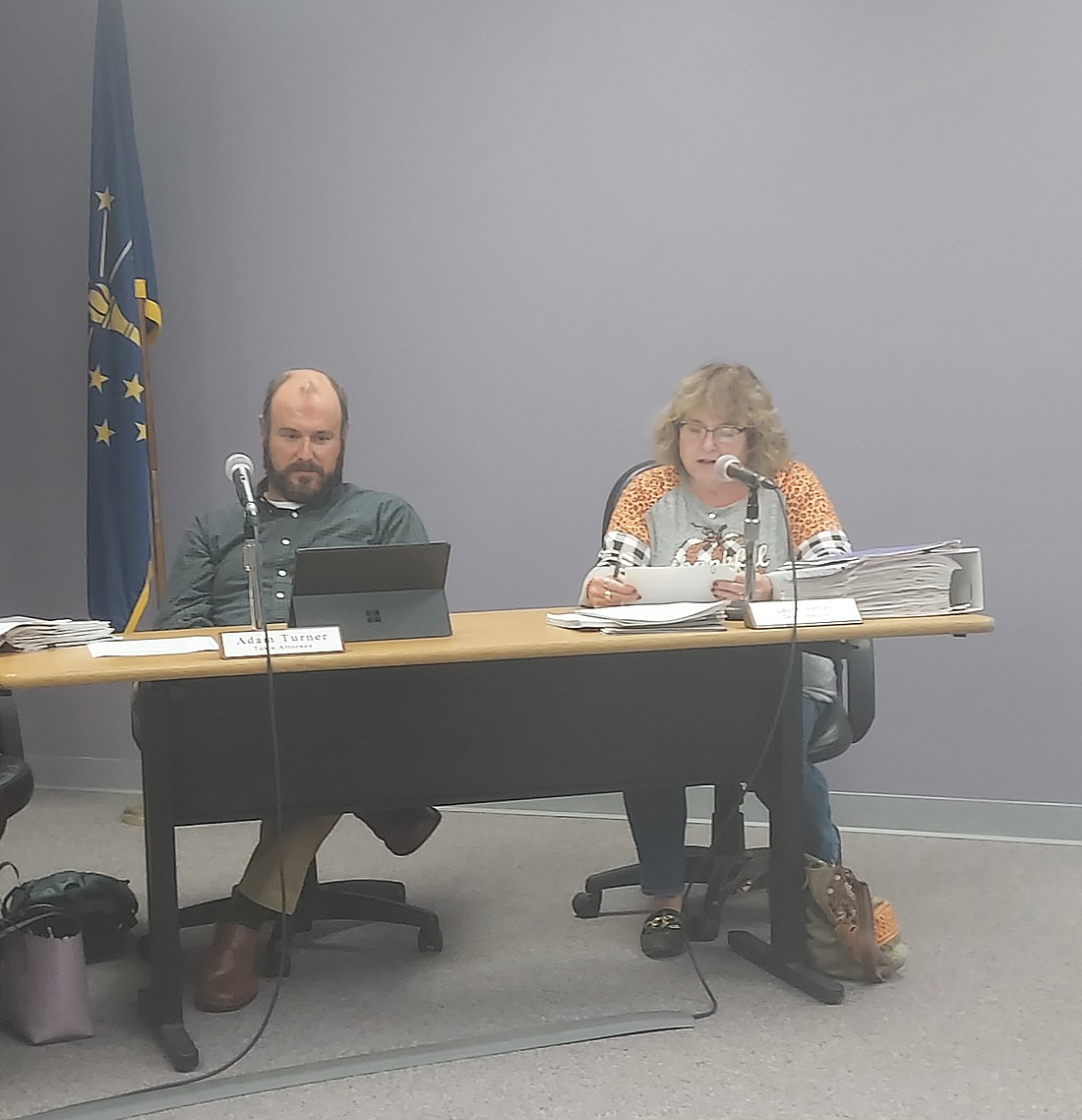 Pictured is Winona Lake Clerk-Treasurer Laurie Renier (R) reading a written statement during the Winona Lake Town Council meeting Tuesday as town attorney Adam Turner (L) listens. Photo by Jackie Gorski, Times-Union