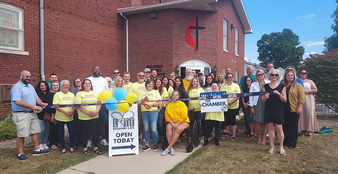 A ribbon-cutting was held by the Syracuse-Wawasee Chamber of Commerce during the grand opening of Living in Transition Effectively’s Recovery Cafe Friday.  Photo by Jackie Gorski, TIMES-UNION