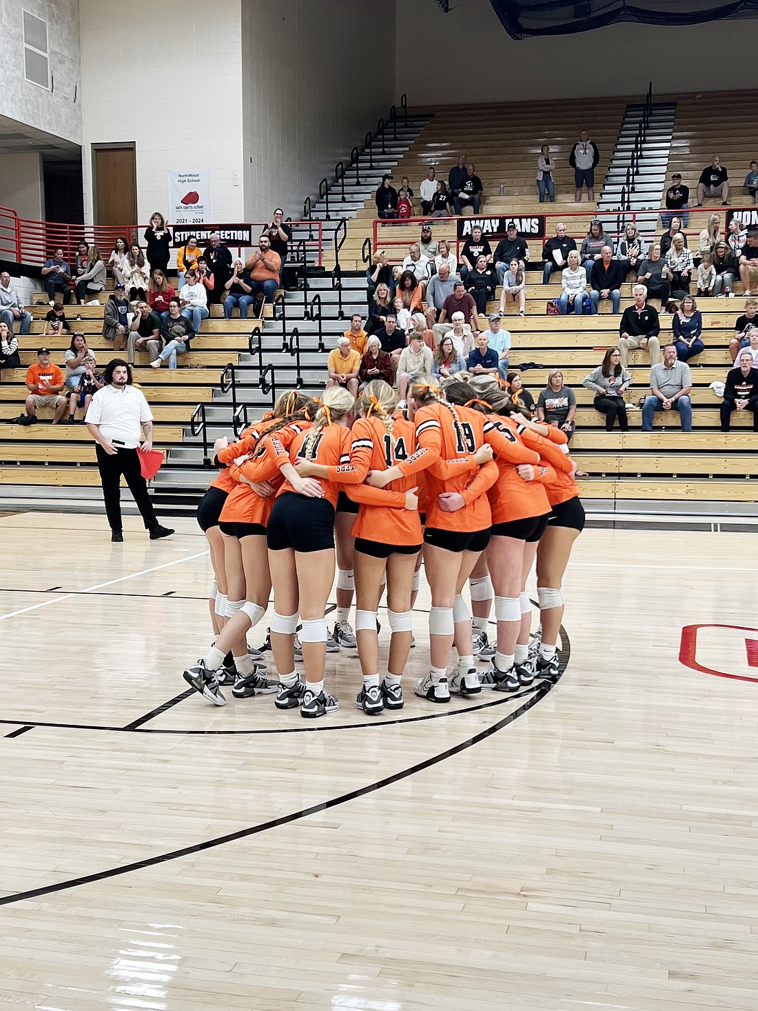 The Warsaw volleyball team huddles up during its conference clinching victory over NorthWood Thursday. Photo provided by Chandra Hepler