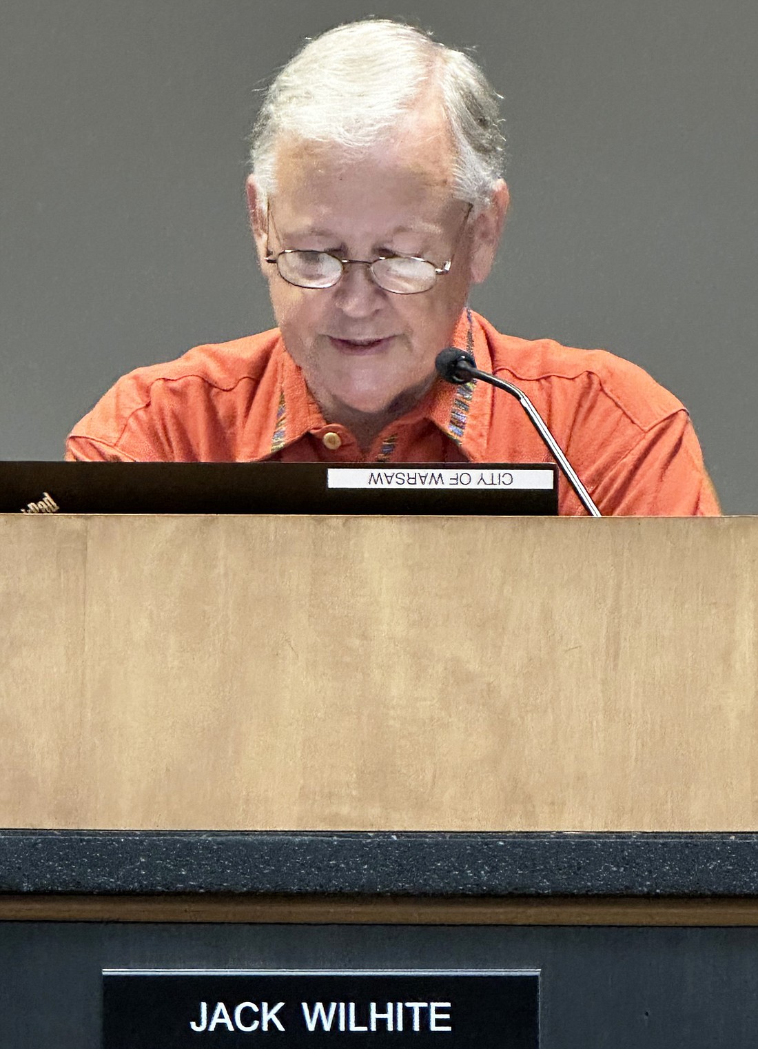 Warsaw Common Council President Jack Wilhite reads his notes regarding his concerns for a pay increase for an employee in the clerk-treasurer’s office for 2024. Photo by David Slone, Times-Union