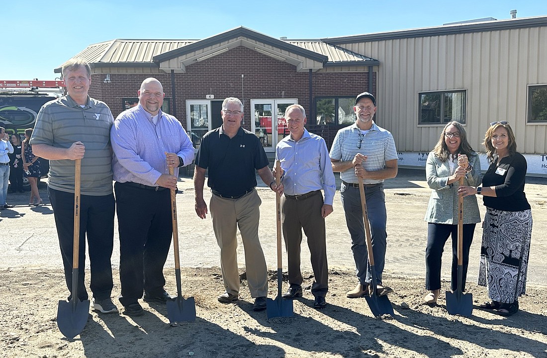 A groundbreaking ceremony for the Downtown YMCA at the former Madison Elementary School gymnasium on West Fort Wayne Street, Warsaw, took place Monday afternoon. Pictured (L to R) are Jim Swanson, Kosciusko YMCA CEO; Scott Schneider, YMCA Board of Directors president; Joe Thallemer, Warsaw mayor; Craig Snow, Indiana state representative; Cary Groninger, G & G Hauling & Excavator co-owner and Gateway Grove co-developer; Lisa O’Neill, Lake City Bank CFO; and Jennifer Stewart, K21 Health Foundation grants manager. Photo by David Slone, Times-Union