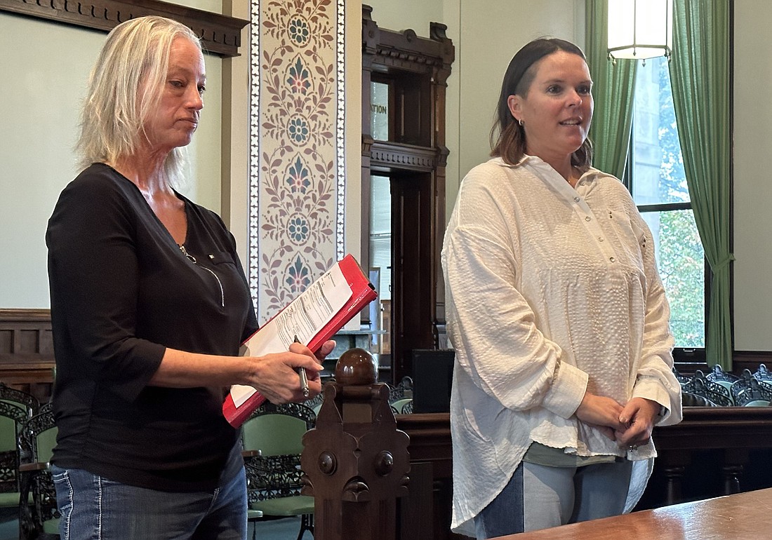 T & C Restaurants LLC, doing business as Lakeside Restaurant, 110 E. Main St., Syracuse, sought a new beer, wine and liquor riverfront permit from the Kosciusko County Alcohol Tobacco Commission on Thursday. Pictured are Casandra Griffin (R), part owner, and Delilah Bruce (L), representing the other owner, Tad Gongwer, at Thursday’s ATC meeting. Photo by David Slone, Times-Union.