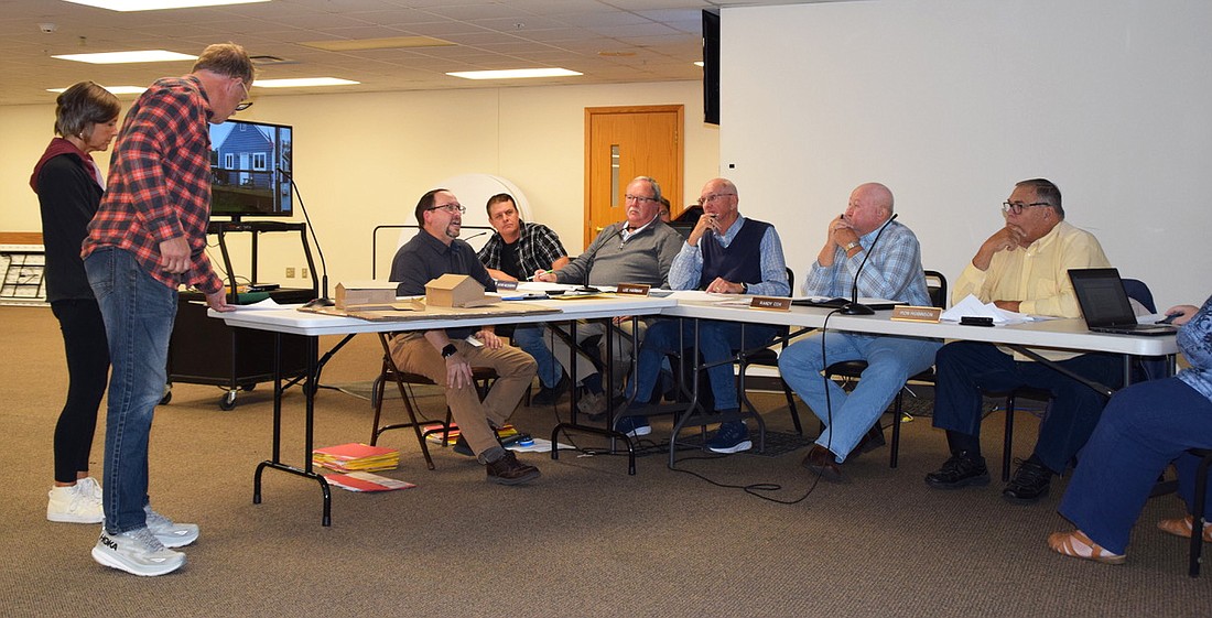Debra and Todd Wilson provided the Kosciusko County Board of Zoning Appeals with a 3D rendering made of cardboard to illustrate what they wanted to do to their home. The board said they set a new bar for exhibits when making a petition. Photo by Lauren Zeugner, InkFreeNews