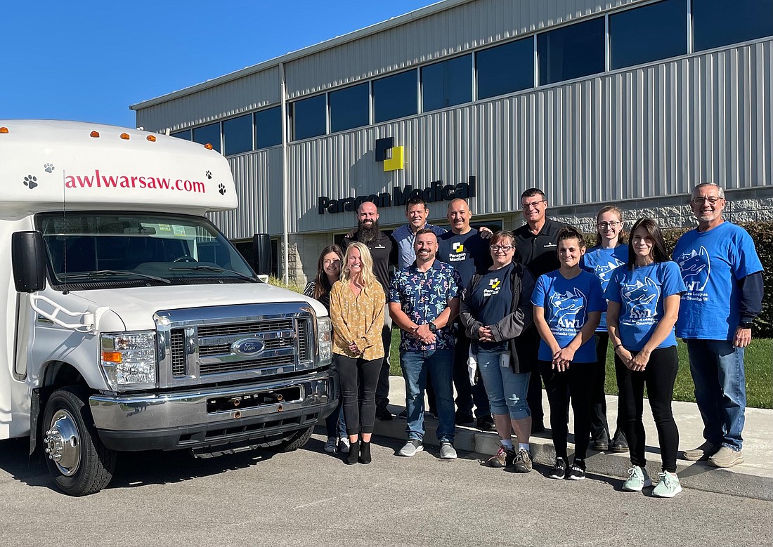 Pictured (L to R) are, front row: Paragon Medical - Kristen Connors, Kirstie Sheets, Byran Rogers, Teri Urhausen; Animal Welfare League (AWL) – Jayme Staner, Jordan Good; back row: Paragon - James Poe, Wil Boren, Dan Blum, Greg Hall; AWL - Ely Wendt, John Lantz. Photo Provided