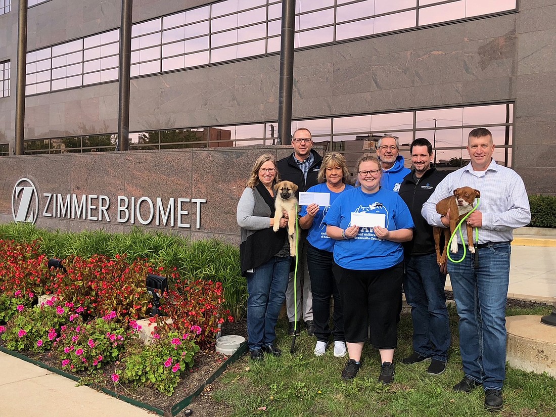 Pictured (L to R) are Tabby McDonald, Zimmer Biomet; Dustyn Arney, Zimmer Biomet; Tonya Blanchard, Animal Welfare League of Kosciusko County executive director; Brooke Lyon, AWL; John Lantz, AWL; Len Tusa, Zimmer Biomet; and Dale Campbell, Zimmer Biomet. Photo Provided.