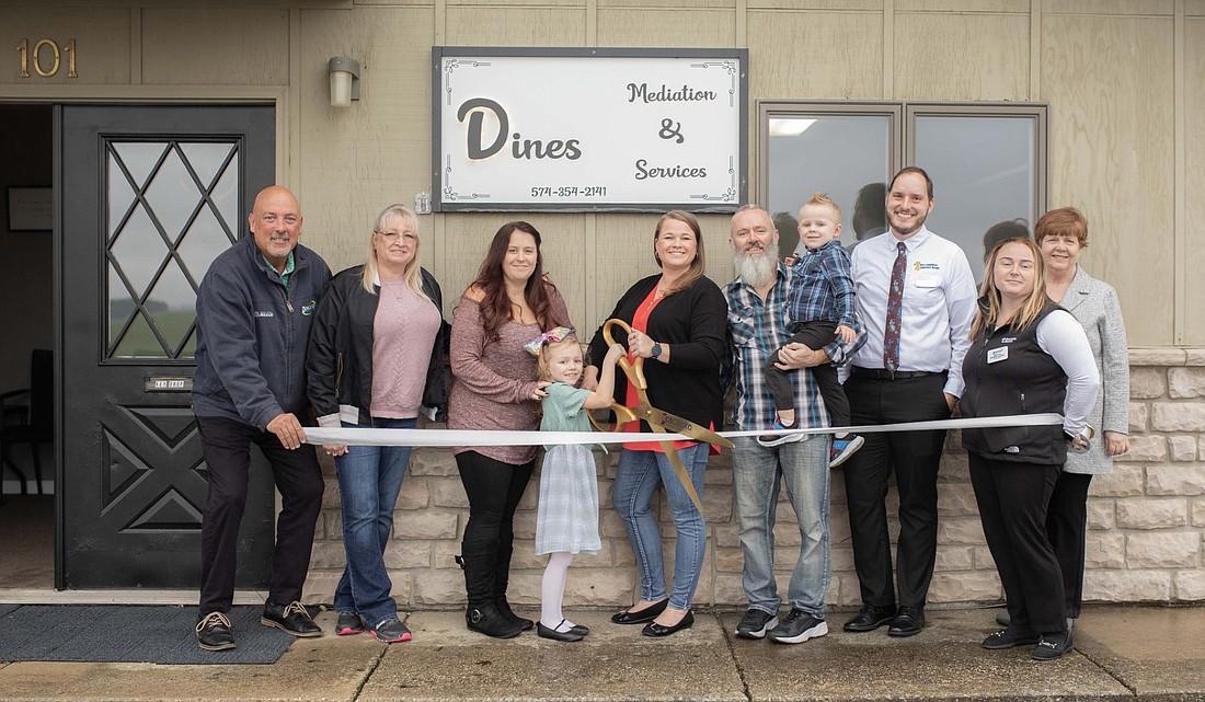 Shown are members and ambassadors from the Kosciusko Chamber of Commerce alongside Amanda Dines, the owner of Dines Mediation and Services, and her family and friends. Pictured (L to R) are Scott Wiley, Amy Slaten, Gloria Miller, Jayme Dines, Amanda Dines, Casey Dines, David Dines, Matthew Bouchard, Heather Lardino and Lynn Brown. Photo Provided by Kosciusko Chamber of Commerce