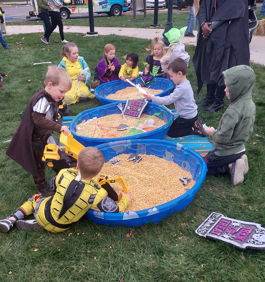 Kids played various games at Limitless Park during Trick-or-Treat on the Trail Saturday Photo by Jackie Gorski, TIMES-UNION