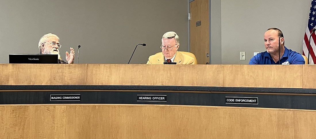 Building Commissioner Ray Behling gives an update to Hearing Officer Thomas Earhart about the property at 3521 Lake City Highway, Warsaw. Photo by Brianna Pitts, InkFreeNews