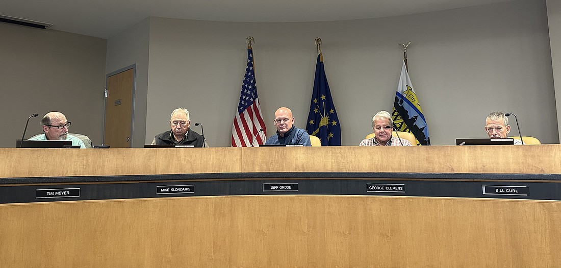 Warsaw Redevelopment Commission members (L to R) Tim Meyer, Mike Klondaris, Jeff Grose, George Clemens and Bill Curl discuss the economic development agreement with West Hill Development at their Monday meeting. Photo by David Slone, Times-Union
