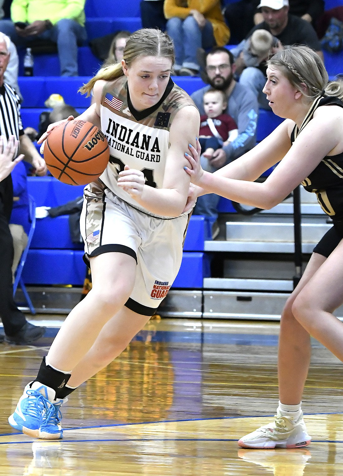 Senior Addyson Viers of Triton drives to the basket during Tuesday night's home opener against Argos. Photo by Gary Nieter