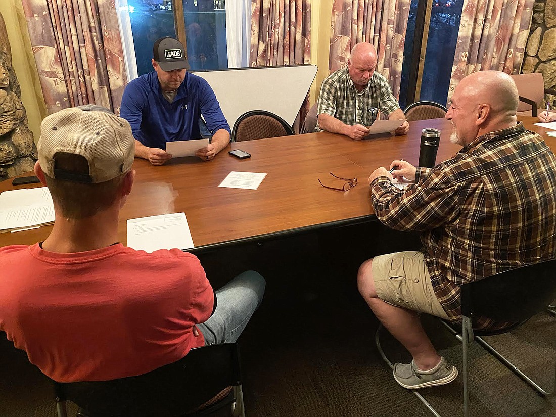 At a special meeting of the Tippecanoe Valley School Board on Tuesday, pictured (L to R) are Board Vice President Adam Heckaman, President David Lash, Secretary Todd Hoffman and member Tom Bauters. Photo by Leah Sander, InkFreeNews