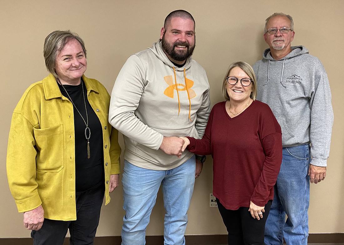 The Mentone Town Council approved hiring Keaton Schopf as the town’s new marshal Thursday. Pictured (L to R) are Councilwoman Shelly Krueger, Schopf, Council President Jill Gross and Councilman Tim Croy. Photo by Leah Sander, InkFreeNews