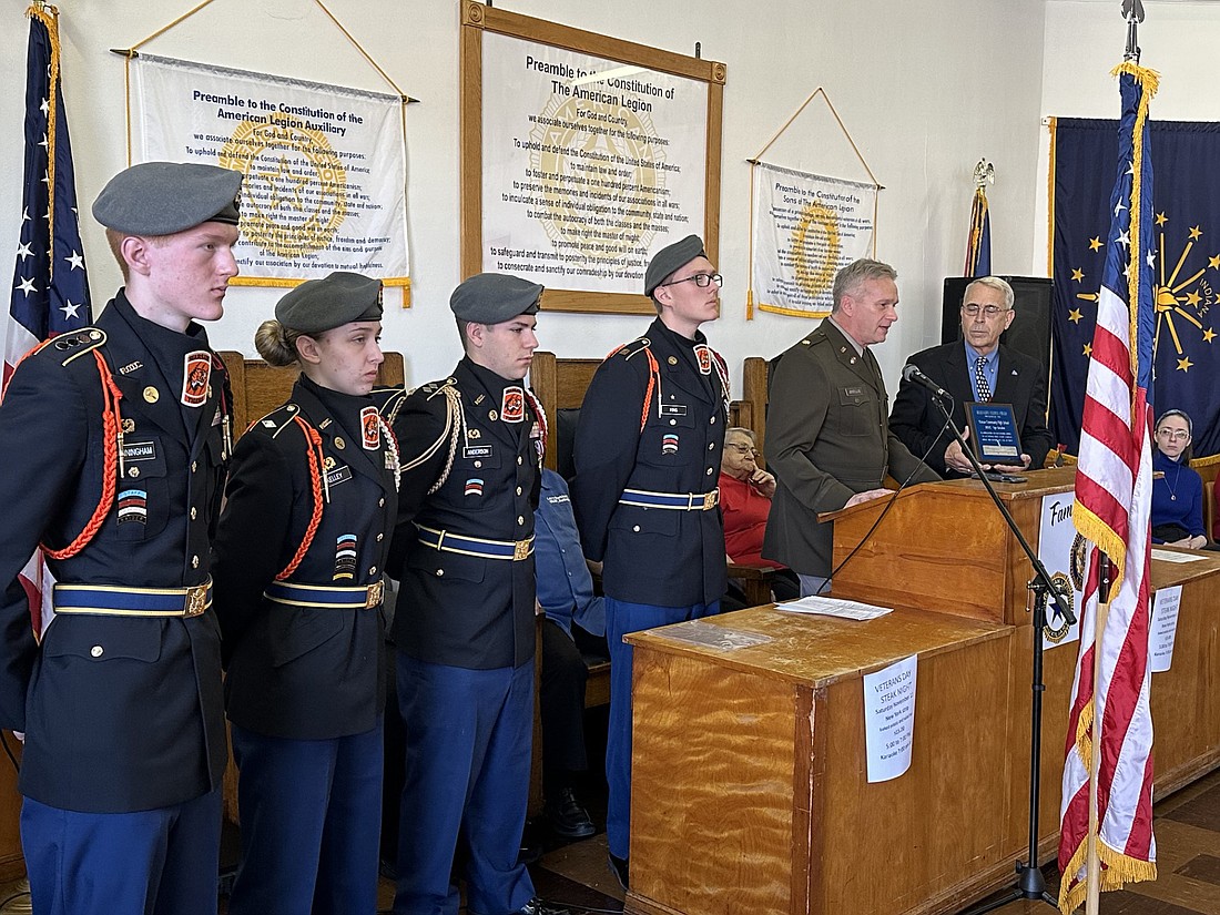 John Sadler presented the Warsaw Community High School Junior ROTC with the Meritorious Service Award today during the Veterans Day ceremony at American Legion Post 49, Warsaw. Pictured (L to R) are WCHS JROTC cadets Jayden Cunningham, Talia Kelley, Nate Anderson and Samuel King and instructor Major (Ret.) Friedrich Josellis and Sadler. Photo by David Slone, Times-Union