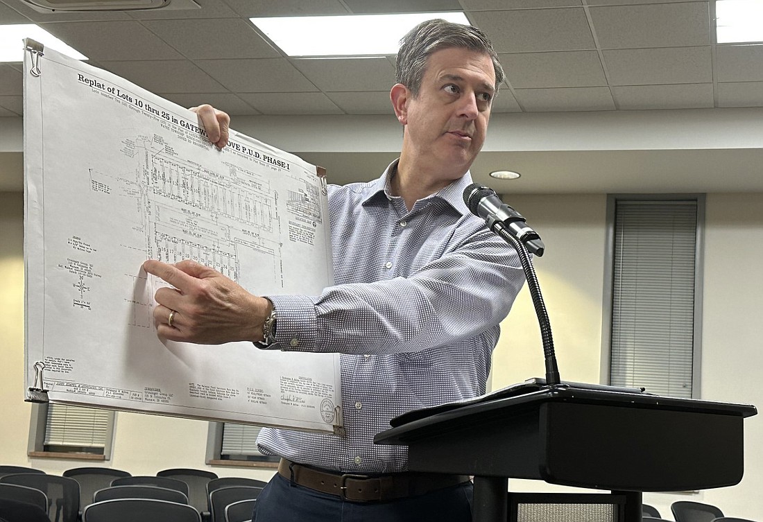 Tim Saylor, planning engineer and president of Innovative Communities, explains a change to the plat for Gateway Grove subdivision to the Warsaw Plan Commission Monday night. Photo by David Slone, Times-Union