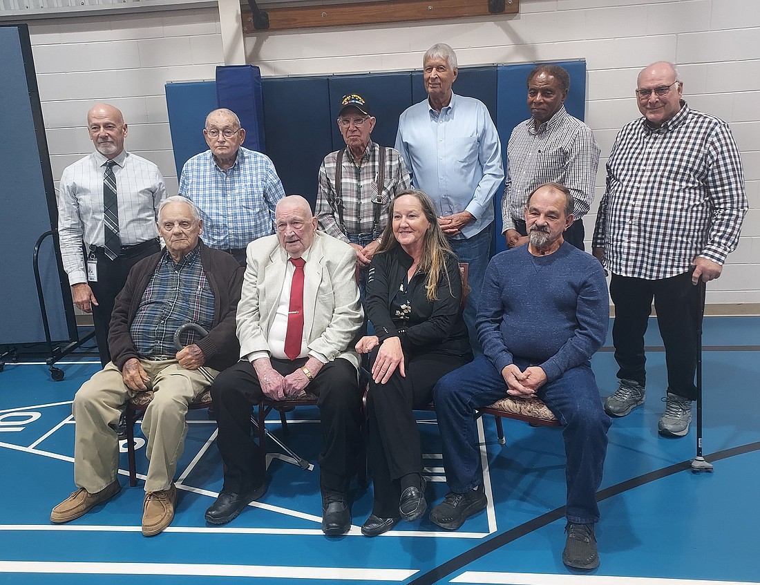 Pictured (L to R) are, front row: John Hurd, Harley Carney, Alisa Leek, Rex Wert Sr.; back row: Terry Leek, Donald Ridenour, Eldon Sauer, Larry Essig, William Cook and Richard Wells. Photo by Jackie Gorski, Times-Union