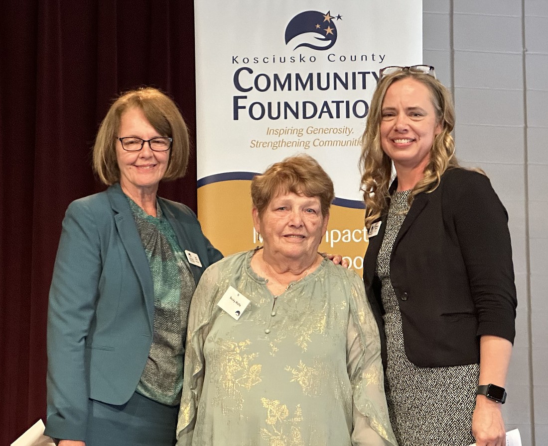 Beck Walls was honored as the 2023 Heart of Gold recipient during the Kosciusko County Community Foundation Annual Celebration Luncheon Wednesday. Pictured (L to R) are Jane Wear, KCCF Board of Directors 2024 secretary; Walls; and Stephanie Overbey, KCCF CEO. Photo by David Slone, Times-Union