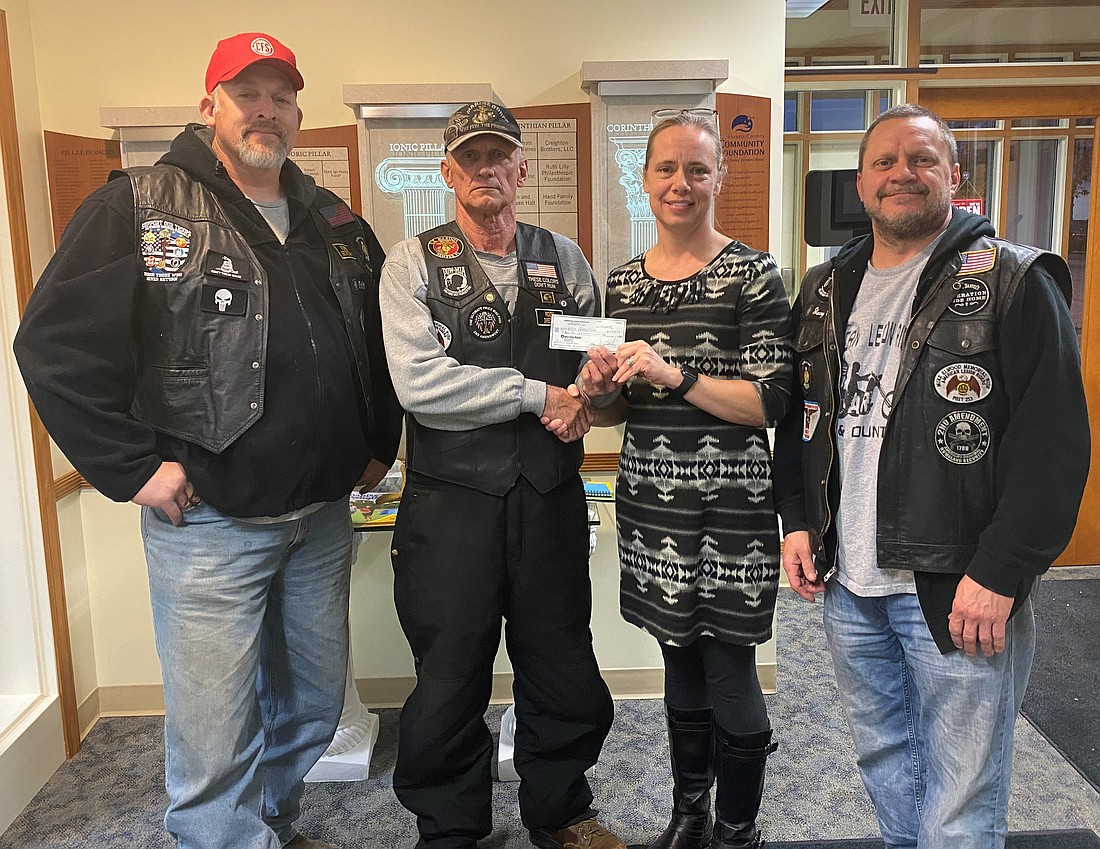 Members of the North Webster American Legion Riders Chapter 253 presented Kosciusko County Community Foundation with a donation of $1,500 for the KC Riley Kids Fund. Pictured (L to R) are Mark Zimmerman, secretary and retired Army; Ronald Ringle, Riders director and retired Marine; Stephanie Overbey, Community Foundation CEO; and Jimmy Cavender, road captain and interim assistant director. Photo provided.