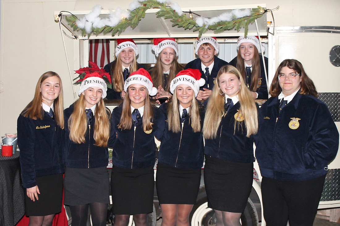 Whitko FFA members gather by the hot drink bar prior to the auction. Photo provided.