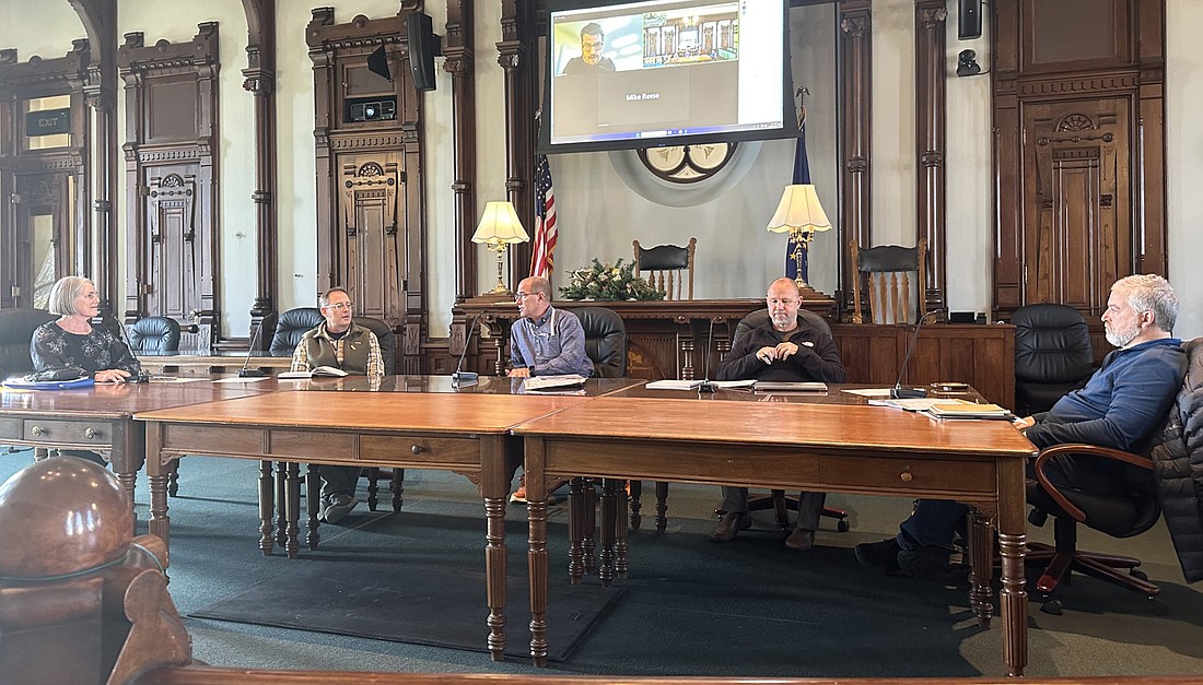 The Kosciusko County Parks and Recreation Board met in a special session Thursday to award the bid for the Lake City Greenway trail extension. By a 3-1 vote, the board awarded the bid to Triad. Pictured (L to R) are board members Aggie Sweeney, Troy Turley, Rob Bishop, Matt Metzger and Mike Cusick. Photo by David Slone, Times-Union