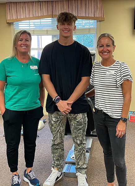 Pictured is WACC intern Corbin Johnston with his supervisors at Healthcare Therapy Services inside Grace Village Retirement Community. Photo Provided.