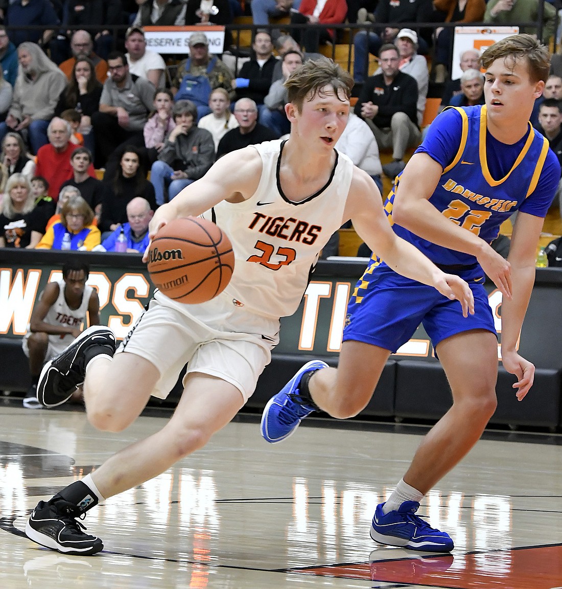 Warsaw junior Brandt Martin drives down the lane en route to the basket during the second quarter. Photo by Gary Nieter