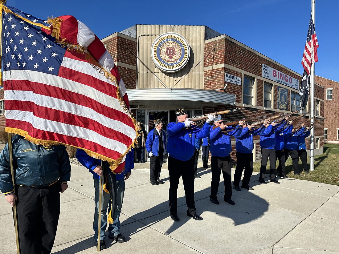 American Legion Post 49 Honor Guard fires a three-round volley Thursday as part of the Pearl Harbor remembrance ceremony. Photo by David Slone, Times-Union