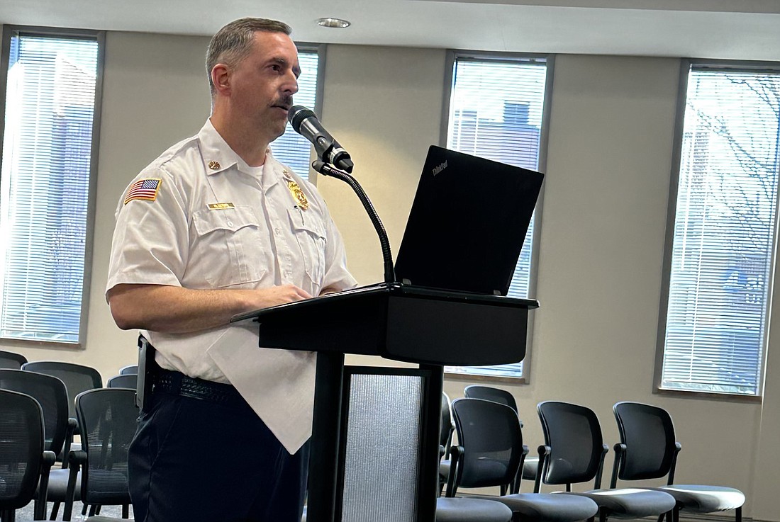 Warsaw-Wayne Fire Territory Chief Brian Mayo tells the Warsaw Board of Public Works and Safety Friday about the ladder truck his department will purchase.  Photo by David Slone, Times-Union
