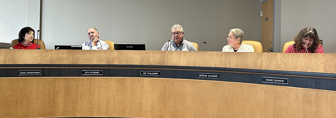 Warsaw Mayor Joe Thallemer responds to the accolades he received from city attorney Scott Reust and the Board of Public Works and Safety members Friday during their meeting. Pictured (L to R) are Clerk-Treasurer Lynne Christiansen, Reust, Thallemer, George Clemens and Diane Quance. Photo by David Slone, Times-Union