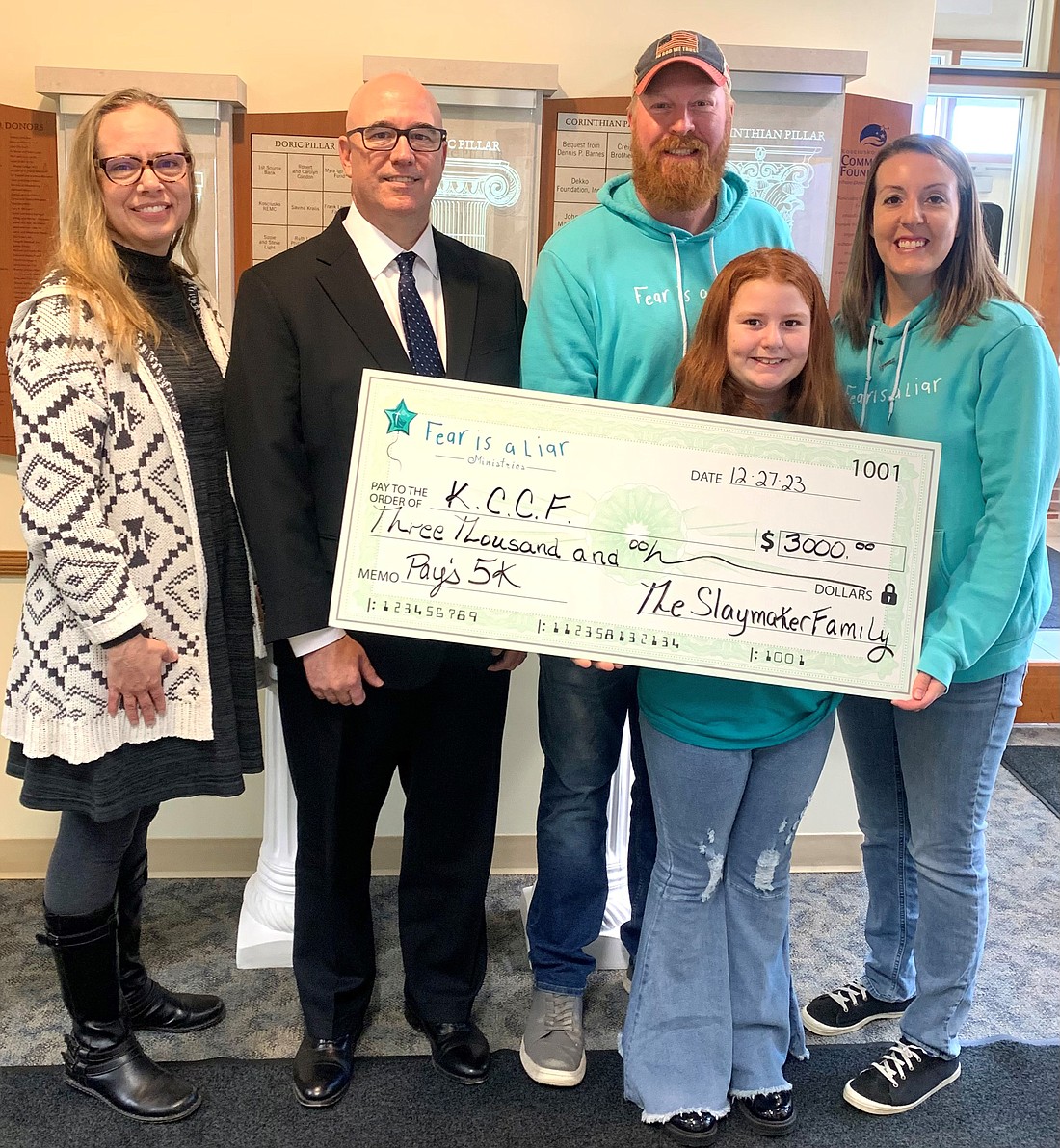 Pictured (L to R) are Stephanie Overbey, CEO of the Kosciusko County Community Foundation; Alan Alderfer; and Andrew, Avery and Kim Slaymaker. Photo Provided.