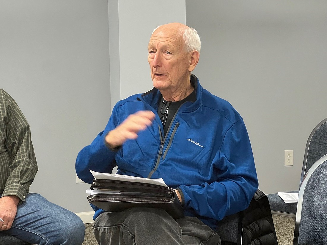 Webster Lake resident Mike Wyrick, representing the Webster Lake Conservation Association, addresses the North Webster Town Council on the condition of the Webster Dam and pending litigation regarding its repair. Photo by Keith Knepp, InkFreeNews