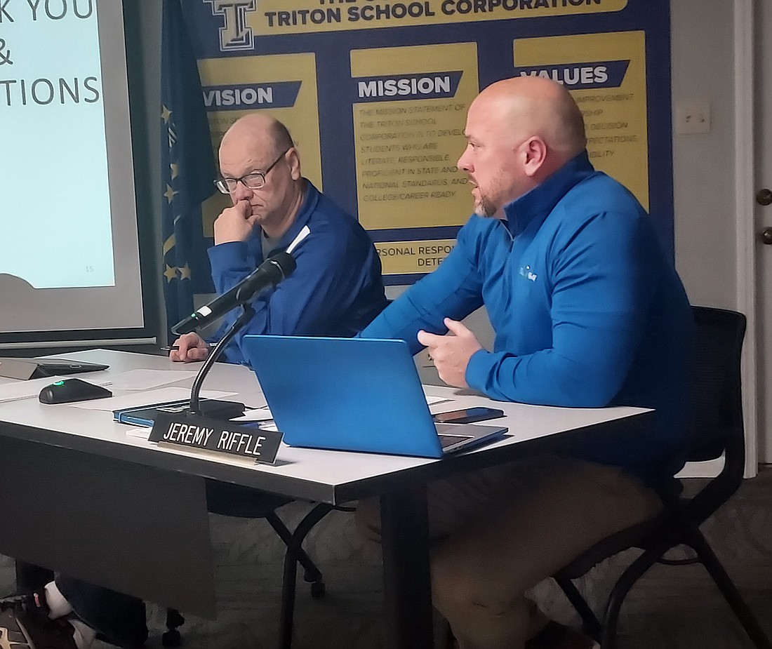 Pictured (L to R) are Triton School Board Secretary Steve Stichter and Superintendent Jeremy Riffle. Photo by Jackie Gorski, Times-Union